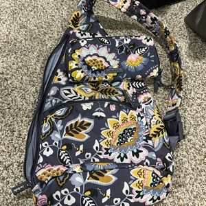 Vera Bradley sling with zip around wallet